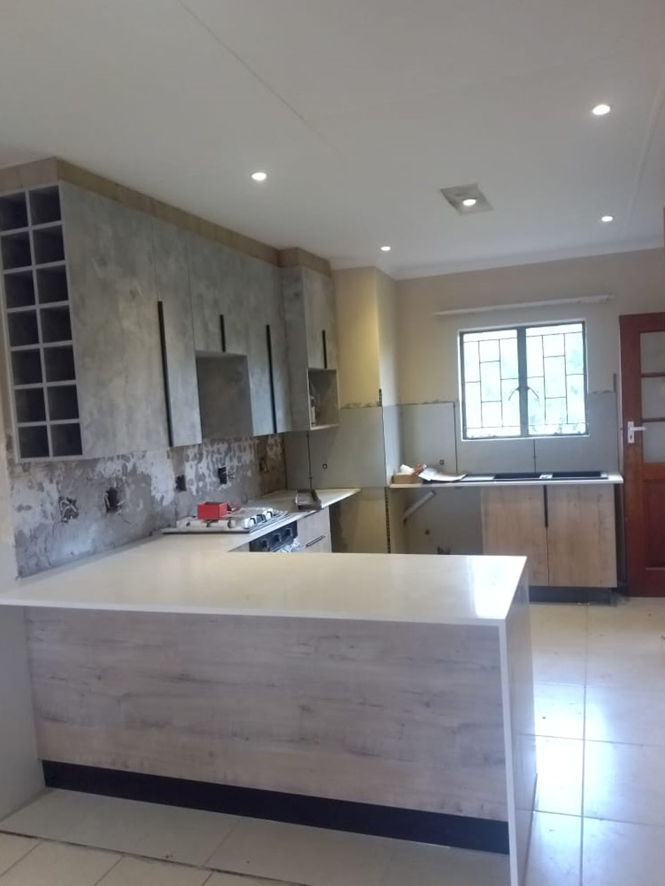 Renovated modern kitchen with new cabinetry by Mictech in Pretoria